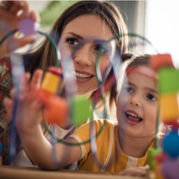 ECE educator with student