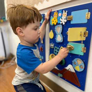 young boy in sensory room at Temple Beth Hillel