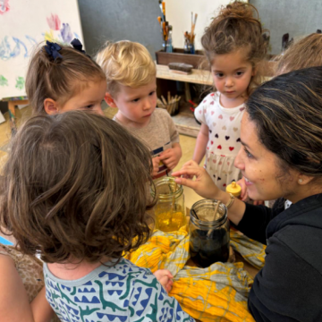 Early childhood children learning from their teacher