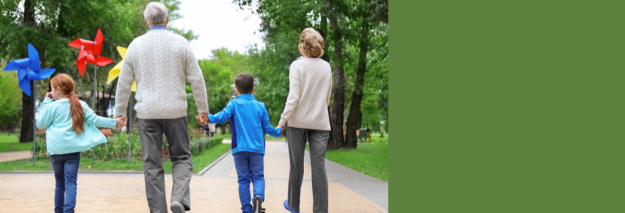 grandparents with children walking