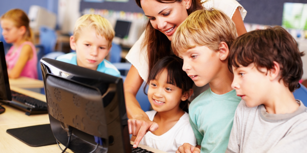 children learning with a happy teacher