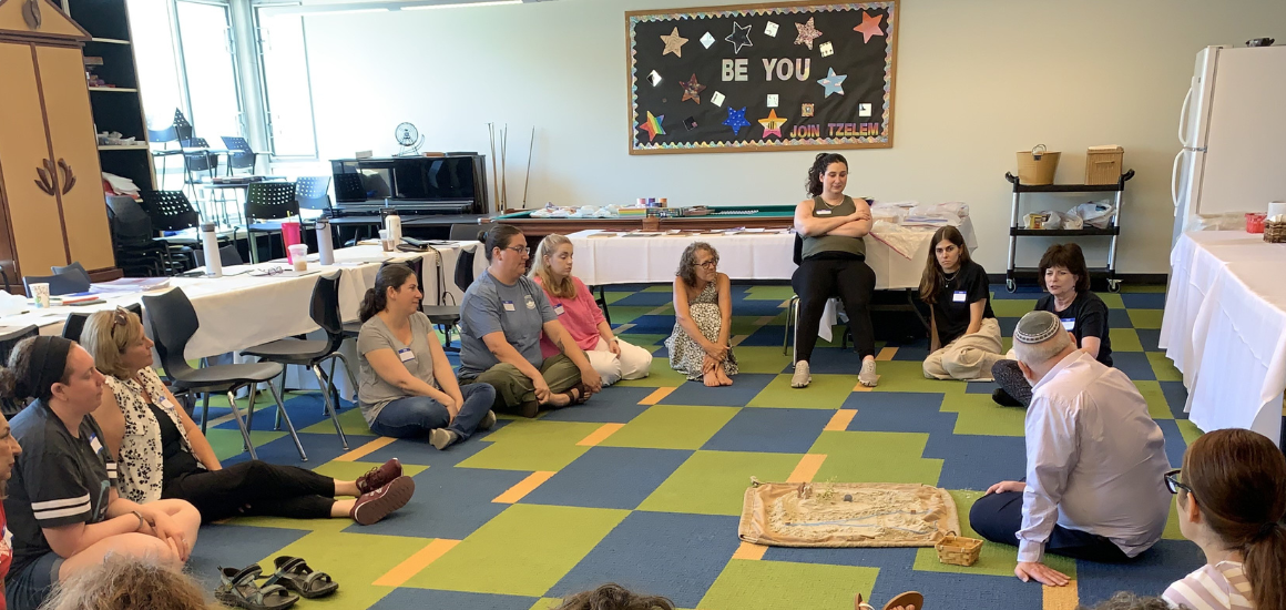 Torah Godly Play educators working with Rabbi