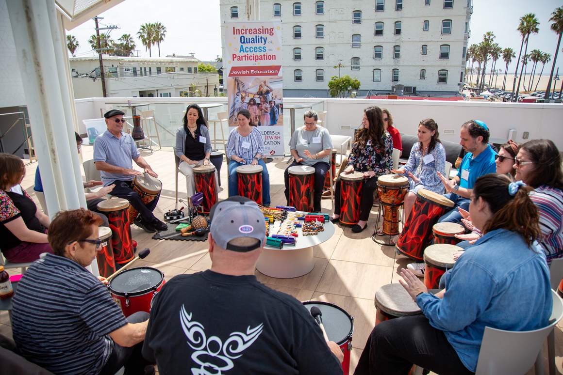 Religious School educators play drums at BAR Center, Venice